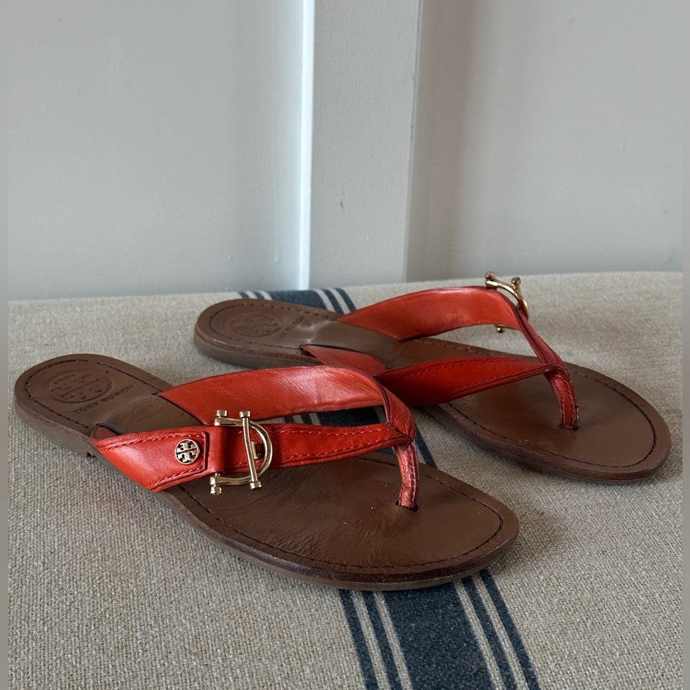 Tory Burch Nora orange leather Flip Flop sandal with gold buckle size 7